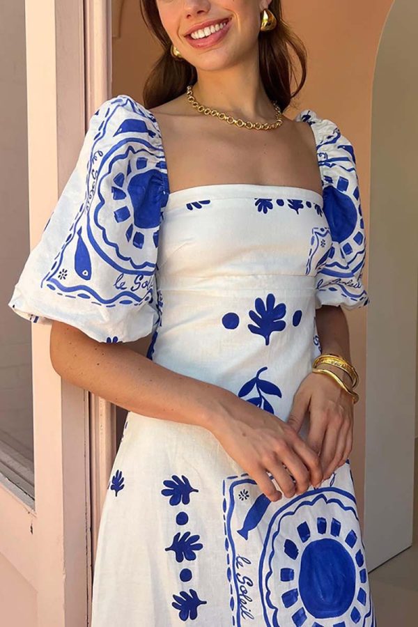 Vestido largo estampado de manga corta abullonada en azul. - Imagen 2